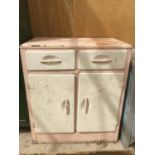 A VINTAGE KITCHEN CABINET WITH TWO DOORS AND TWO DRAWERS