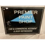 A 'PREMIER PAINT SHOP CAR & COMMERCIAL ACCIDENT & BODY REFINISHERS' ADVERTISING SIGN