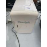 A MICROMARK MICRO COOLER, NO SHELF, NEEDS A CLEAN