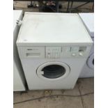 A BOSCH WASHING MACHINE WFF 1201, IN NEED OF A CLEAN WORKING ORDER