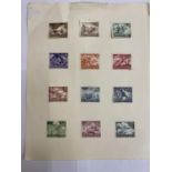 TWELVE WWII GERMAN STAMPS