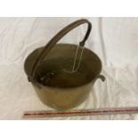 A VINTAGE BRASS JAM PAN WITH CAST IRON HANDLE