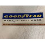 A 'GOODYEAR MADE TO FEEL GOOD' METAL SIGN