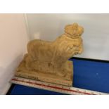 A 'CARING FORCE FOR THE FUTURE' LION WEARING A CROWN MONEY BOX