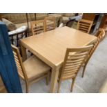 A BEECH DINING TABLE AND SIX DINING CHAIRS