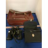 A PAIR OF MIRANDA BINOCULARS WITH A CASE AND A LEATHER SATCHEL