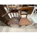 A MAHOGANY CAPTAIN'S CHAIR AND A PINE DINING CHAIR