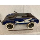 A VINTAGE TORING WOEI CHILDRENS PEDAL RACING CAR IN BLUE