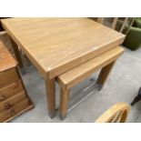TWO MODERN OAK DINING TABLES WITH METAL STRETCHER RAILS