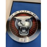 A JAGUAR CIRCULAR METAL SIGN