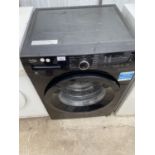 A BEKO WASHING MACHINE, NEEDS A CLEAN, IN WORKING ORDER