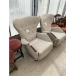 TWO BEIGE WING BACK ARMCHAIRS