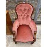 A MAHOGANY BUTTON BACK NURSING CHAIR