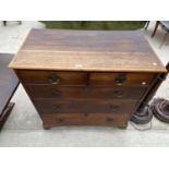 A GEORGIAN OAK CHEST OF TWO SHORT AND THREE LONG DRAWERS