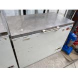 A CHEST FREEZER, NEEDS A CLEAN, IN WORKING ORDER