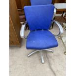TWO RETRO HEAVY BARBER'S CHAIRS WITH BLUE UPHOLSTERY AND METAL SUPPORTS