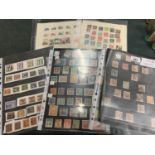 A LARGE COLLECTION OF CHINESE STAMPS