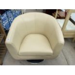 AN ARIGHI BIANCHI CREAM LEATHER SWIVEL ARMCHAIR OB CHROME SUPPORT IN VERY GOOD CONDITION