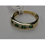 A 9CT YELLOW GOLD EMERALD AND DIAMOND ETERNITY RING, INSURANCE VALUE £2635.00