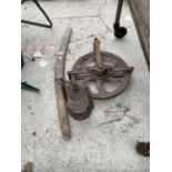 A VINTAGE PULLEY, LANTERN AND YOKE