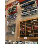 A LARGE COLLECTIPON OF TOY CARS, BOATS, PLANES AND A COLLECTORS BOX