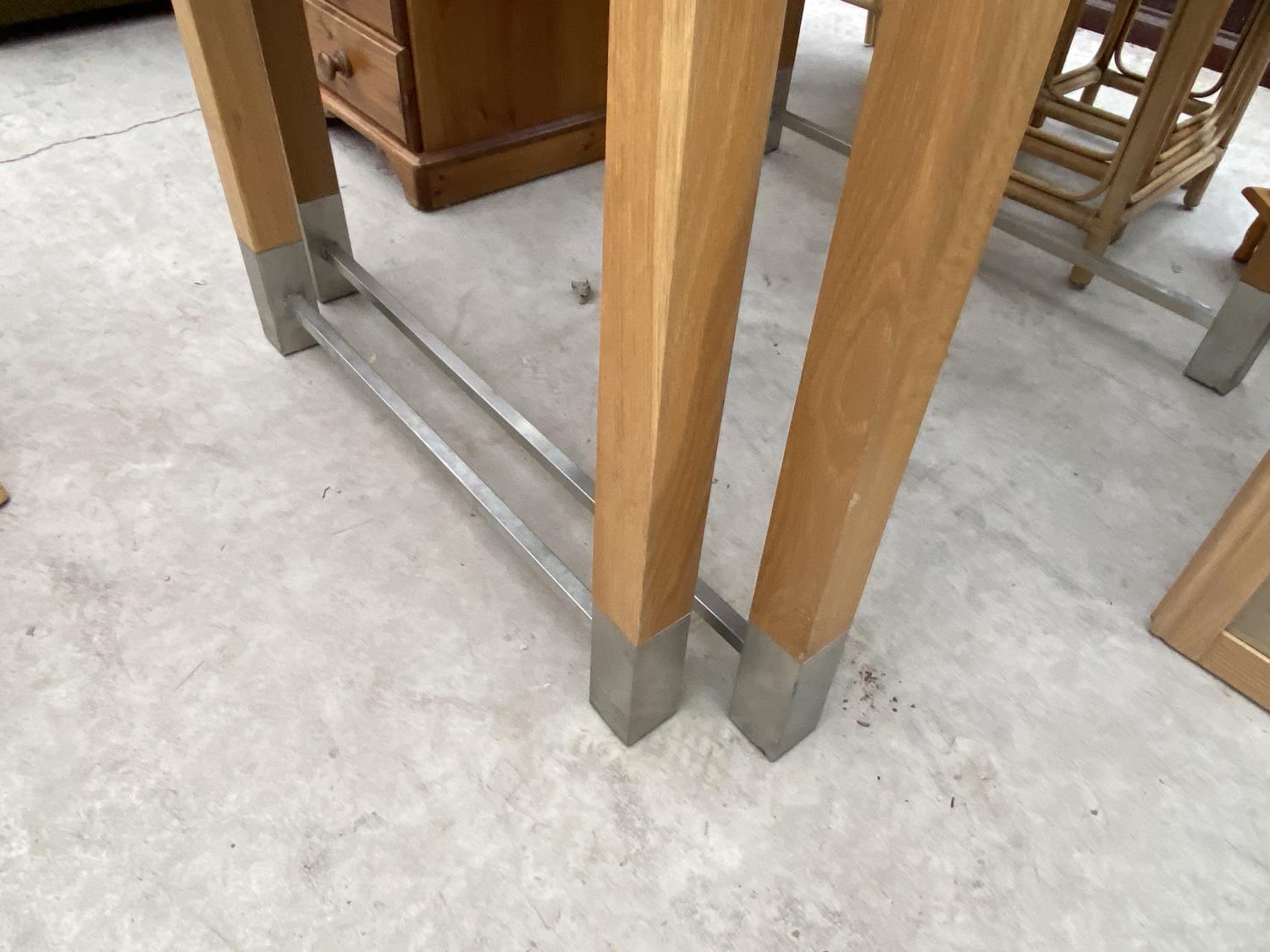 TWO MODERN OAK DINING TABLES WITH METAL STRETCHER RAILS - Image 3 of 4
