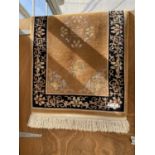 A BROWN PATTERNED RUG