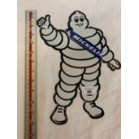 A MICHELIN MAN ADVERTISING SIGN