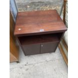 A SMALL MAHOGANY CABINET WITH TWO DOORS