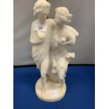 A CARVED ALABASTER STATUE OF TWO WOMEN 37CM HIGH A/F