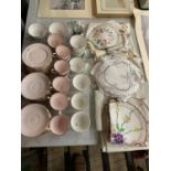 A LARGE COLLECTION OF EMBRIODERED LINEN AND LACE MATS AND CUPS AND SAUCERS ETC