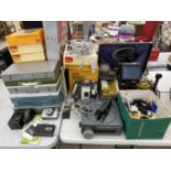 A LARGE QUANTITY OF PROJECTOR EQUIPMENT AND ACCESSORIES TO INCLUDE A KODAK CAROUSEL, TRAYS, VIEWERS,