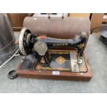 A VINTAGE SINGER SEWING MACHINE