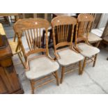 THREE CARVED OAK DINING CHAIRS