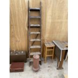 A VINTAGE TERRACOTTA CHIMNEY PORT AND A PAIR OF WOODEN STEPLADDERS