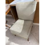 AN UPHOLSTERED BEDROOM CHAIR