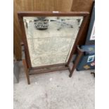 AN ORNATE MAHOGANY DRESSING TABLE MIRROR