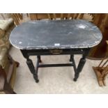 AN EBONISED SIDE TABLE WITH SINGLE DRAWER