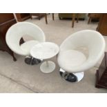 TWO RETRO SWIVEL TUB CHAIRS ON CHROME SUPPORTS AND A SMALL COFFEE TABLE