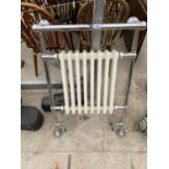 A MYSON CHROME AND CREAM PAINTED TOWEL HEATER