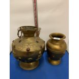 TWO LARGE BRASS POTS WITH ASSORTED STONES ONE WITH ORNATE DETAILING