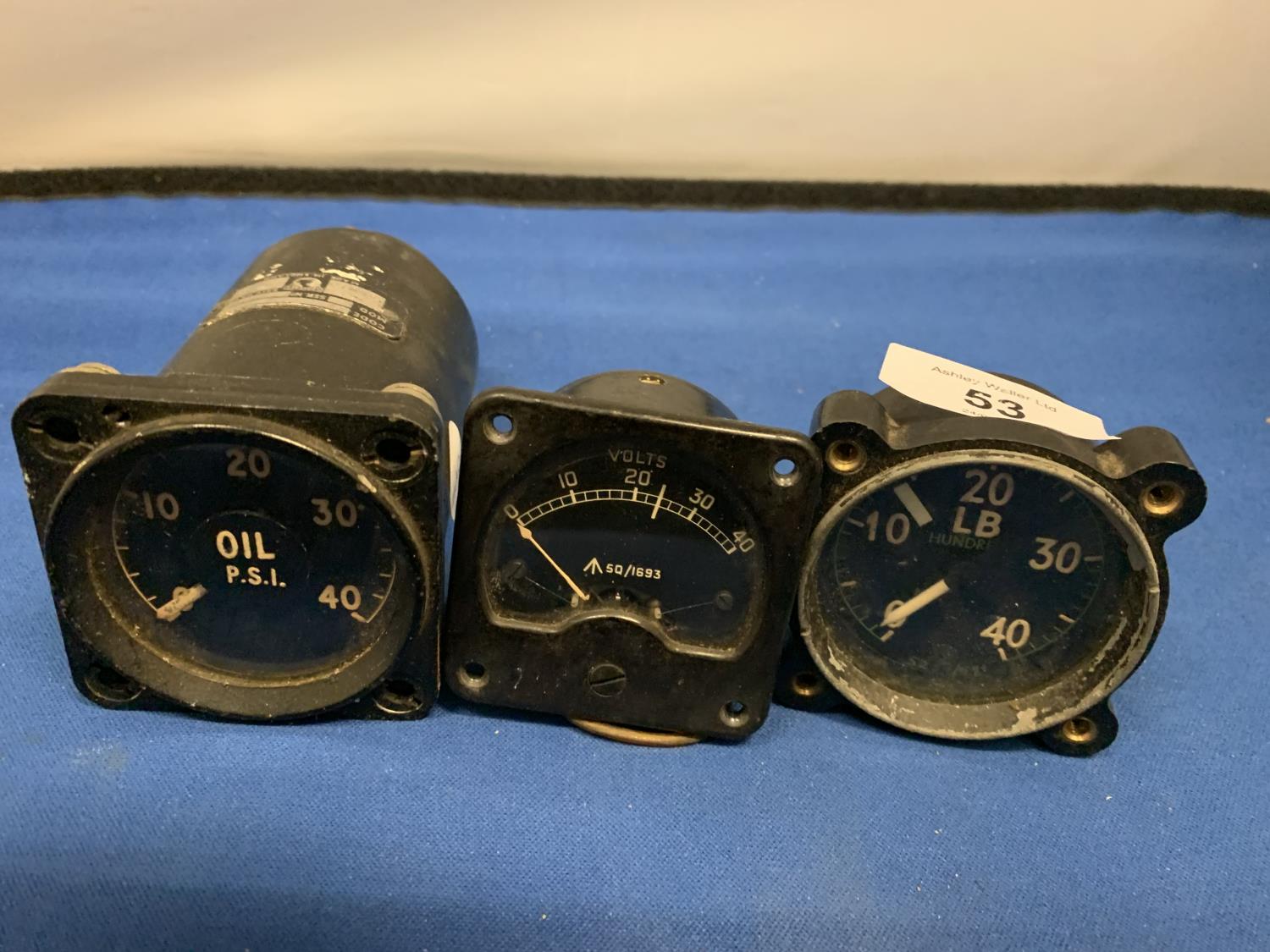 THREE AERONAUTICAL GAUGES - A SMITHS OIL PSI GAUGE, VOLT GAUGE AND A SIMILAR MARKED WITH CROW FOOT