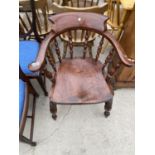 A VICTORIAN ELM SEATED CAPTAIN'S CHAIR