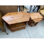 A PINE TV STAND AND AND A PINE NEST OF TABLES