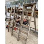 THREE SETS OF VINTAGE WOODEN STEP LADDERS