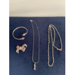 SILVER FIGARO NECKLACE, PENDANT ON SNAKE NECKLACE, A SILVER CZ SET BANGLE AND A COSTUME PINK STONE