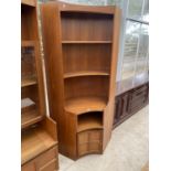 A RETRO TEAK CORNER CABINET WITH LOWER DOOR