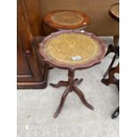 TWO LEATHER TOPPED WINE TABLES - ONE MAHOGANY, ONE YEW WOOD