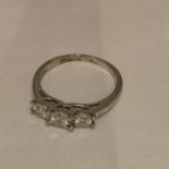 9CT HALLMARKED WHITE GOLD DIAMOND TRILOGY RING ILLUSION SET. TOTAL GROSS WEIGHT 3 GRAMS