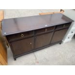 A STAG MINSTREL MAHOGANY SIDEBOARD WITH THREE DOORS AND THREE DRAWERS